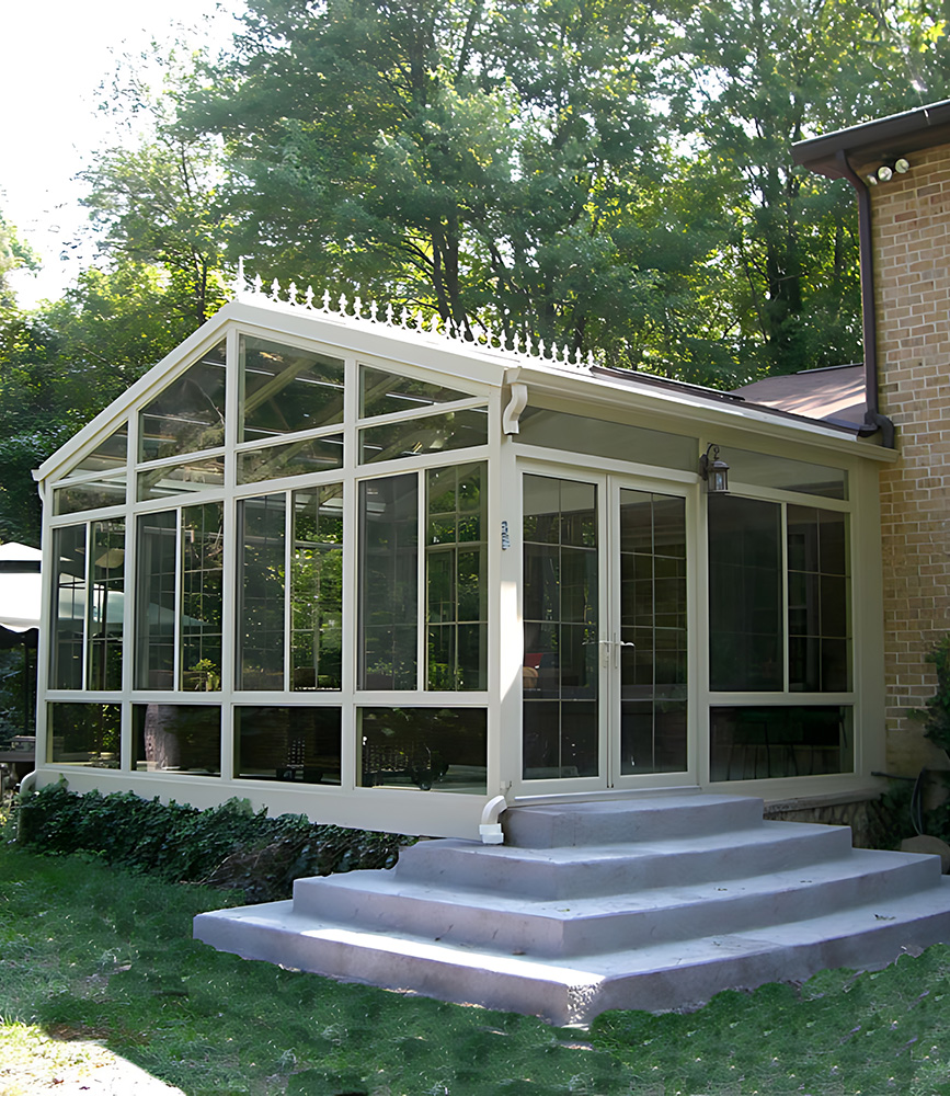 Photo of an elegant sunroom on th back of a house